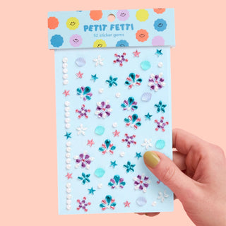 Face Sticker Set with sparkly sticker gems featuring 3D seashells, pearl stars, gemstones, and flowers for kids