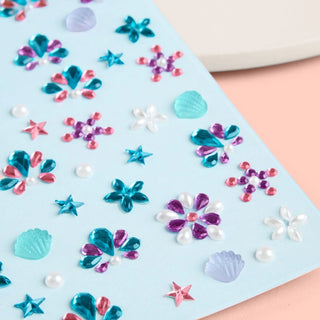 Face Sticker Set with sparkly sticker gems featuring 3D seashells, pearl stars, gemstones, and flowers for kids