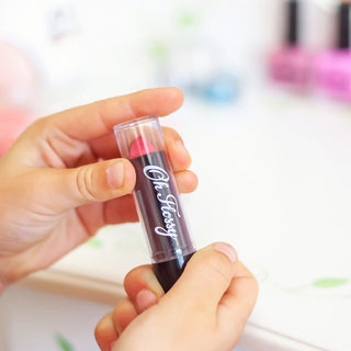 Oh Flossy Play Lipstick for Kids in pink and purple, 100% natural and vegan, safe for sensitive lips, washable, and free from toxins
