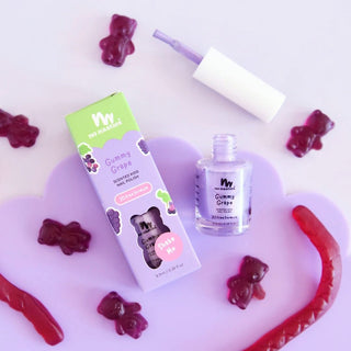 Bottle of naturally scented peel off nail polish in purple labeled as the best nail polish for toddlers, safe and non-toxic