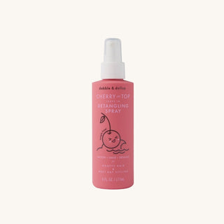 Dabble & Dollop detangler leave-in conditioner spray for kids that smooths knots and leaves hair soft, manageable, and lightly scented
