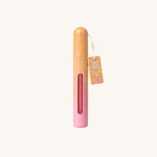 Eco Glam Girl pink shimmer lip gloss with bamboo cap