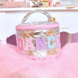 Metallic silver cosmetic bag for kids with 'DANCE' text in pastel rainbow on a white background