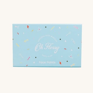 Oh Flossy face paint palette packaging on a light blue background with colorful designs.