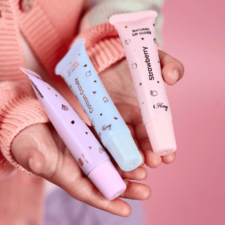 Non toxic lip gloss for kids in natural flavors, available as gift set or singles