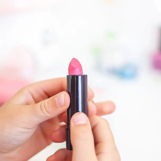 Oh Flossy Play Lipstick for Kids in pink and purple, 100% natural and vegan, safe for sensitive lips, washable, and free from toxins