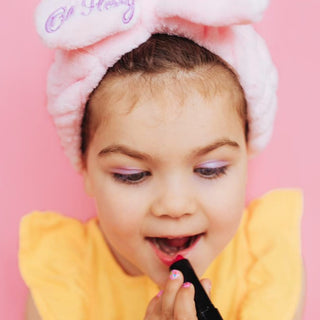 Oh Flossy Play Lipstick for Kids in pink and purple, 100% natural and vegan, safe for sensitive lips, washable, and free from toxins
