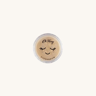 Gold eyeshadow container with 'Oh Flossy' branding on a white background