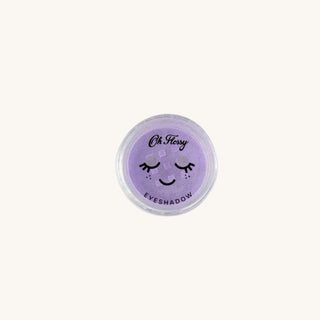 Purple eyeshadow container with 'Oh Flossy' branding on a white background