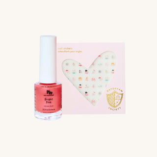 Non-toxic pink Christmas nails with holiday nail art stickers for kids