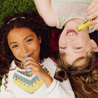 Poppy and Pout kids lip balm in fruity flavors, natural kids chapstick with a push-up tube design for easy use by children