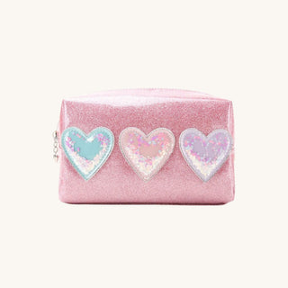 Pink glitter kids makeup bag with three pastel sequin hearts on the front