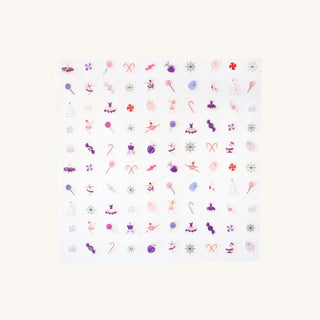 Sugarplum nail sticker sheet with pink and purple ballerinas, candy canes, sweets, snowflakes and Christmas trees.